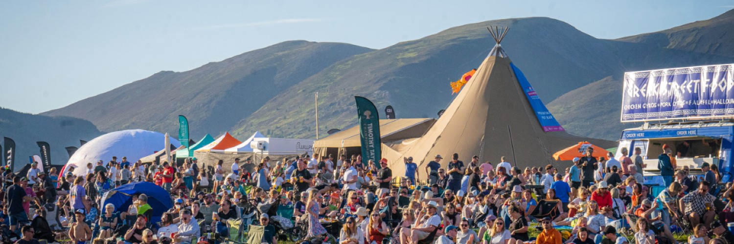 Tents and visitors at Keswick Mountain Festival in Keswick, Lake District